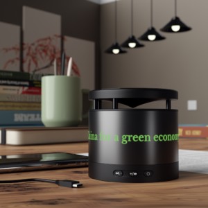 China for a green economy (English) - metal Bluetooth speaker and wireless charging pad